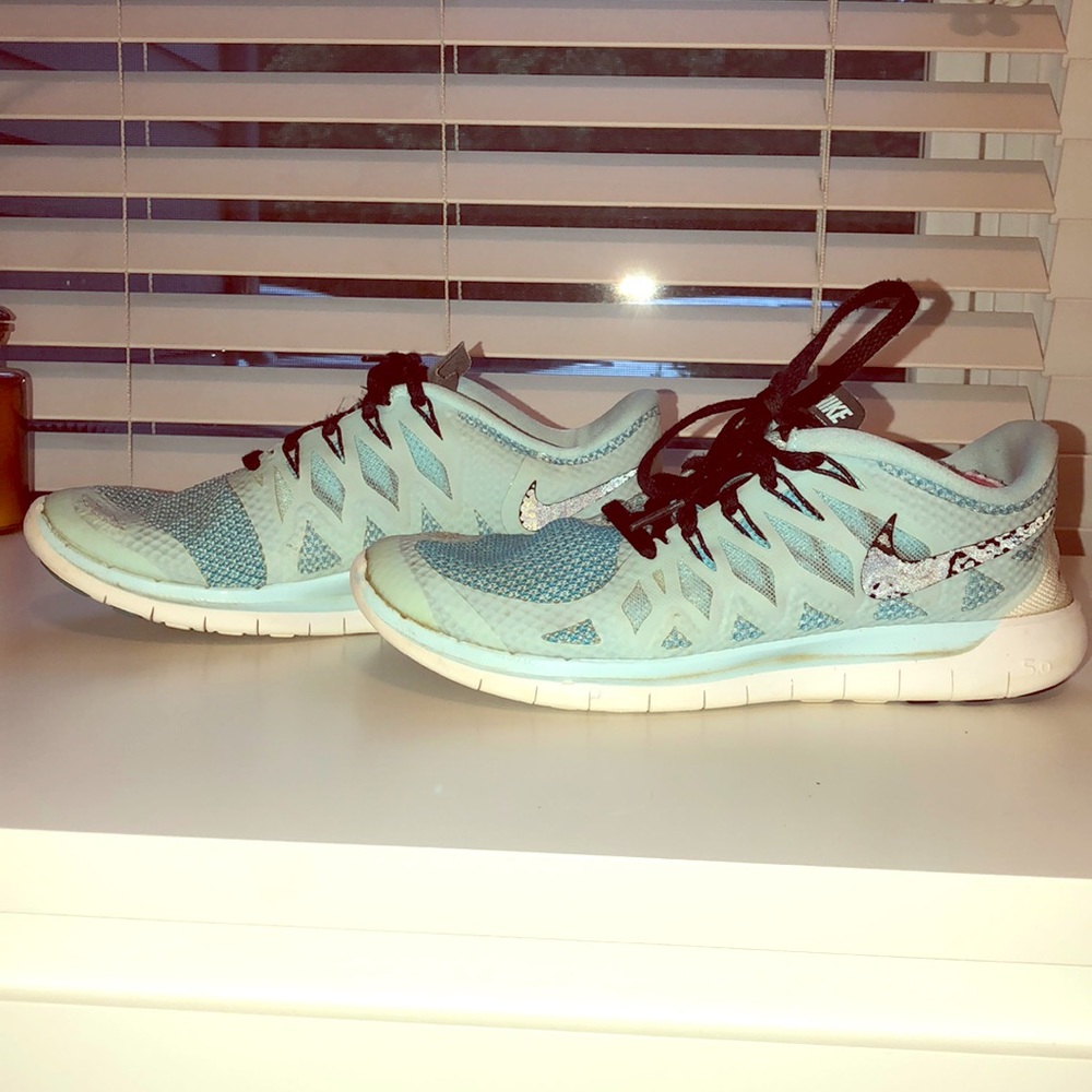 Baby blue nike free run sneakers